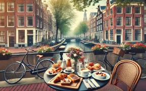 cozy outdoor breakfast café in Amsterdam by a canal, with a table set for breakfast, including pastries, eggs, and coffee, with traditional Amsterdam buildings in the background.