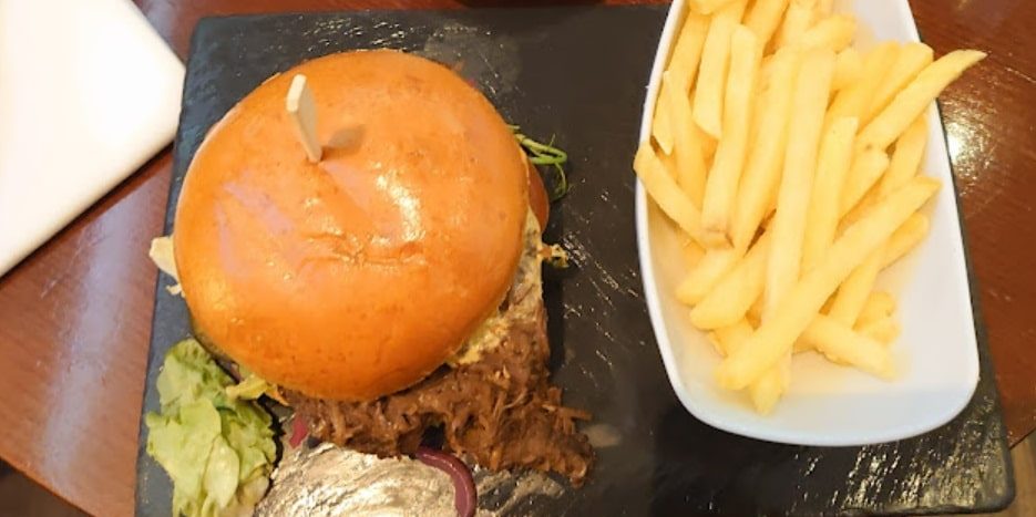 burger with slow cooked beef and french fries in bern the BEEF steakhouse-min